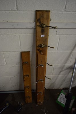 Lot 824 - Three coat racks