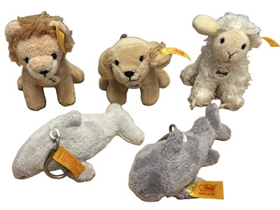 Lot 407 - Five Steiff animal keychains, to include Lion,...