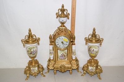 Lot 44 - 20th century porcelain and brass clock garniature