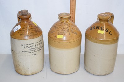 Lot 153 - Three small stoneware flagons to include Norwich