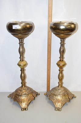Lot 154 - Pair of metal pedestal ashtrays