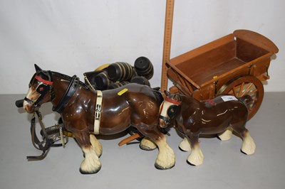 Lot 196 - Two model horses and carts