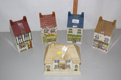 Lot 210 - Wade village stores jars and a similar cheese...