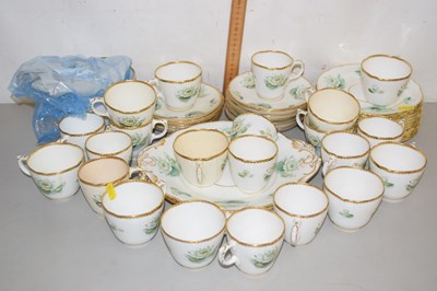 Lot 556 - Waterlilly pattern gilt rimmed teawares