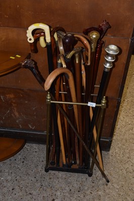 Lot 274 - brass stick stand containing a collection of...