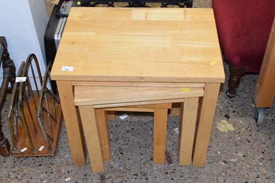 Lot 297 - Nest of light wood tables