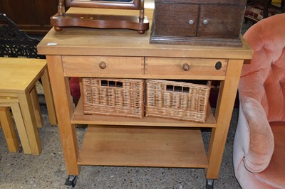 Lot 298 - Light oak kitchen island cabinet with baskets