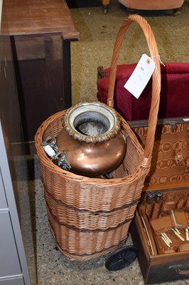 Lot 320 - Copper tea urn and a wicker shopping basket