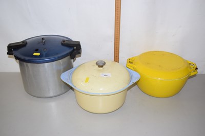 Lot 594 - Pressue cooker and two vintage casarole pots