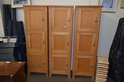 Lot 716 - Set of three narrow oak cupboards