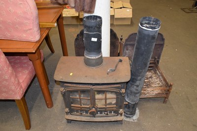 Lot 766 - Cast iron wood burner and flue
