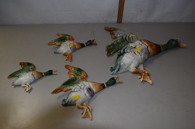Lot 13 - Set of pottery wall ducks, damaged condition