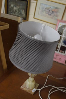 Lot 292 - Polished stone table lamp