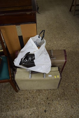 Lot 320 - Two vintage suit cases and a qty of coat hangers