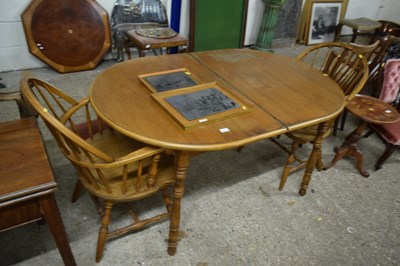 Lot 354 - Modern oak finish dining table and two stick...