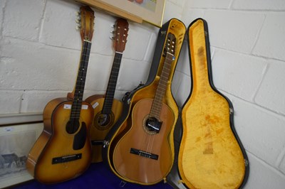 Lot 567 - Three guitars