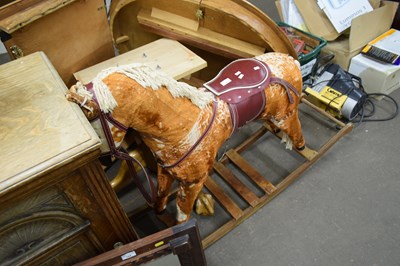 Lot 765 - Retro fabric covered rocking horse