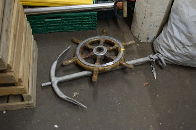 Lot 787 - Boat wheel and anchor (2)