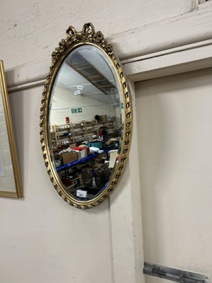 Lot 691 - Oval bevelled wall mirror