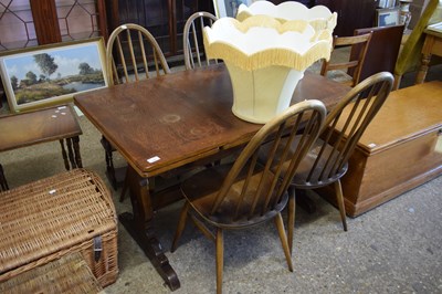 Lot 344 - ERCOL DRAW LEAF DINING TABLE AND FOUR STICK...