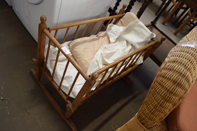 Lot 776 - SMALL WOODEN FRAMED ROCKING COT
