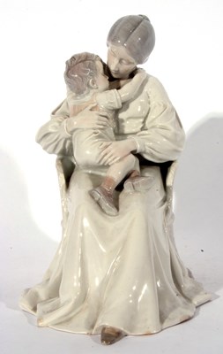 Lot 23 - Large Royal Copenhagen model of a lady seated...