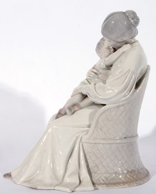 Lot 23 - Large Royal Copenhagen model of a lady seated...