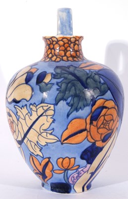 Lot 29 - Bursley ware ewer with a design of flowers on...