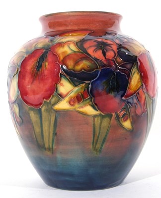 Lot 36 - Moorcroft vase with the orchid design on...
