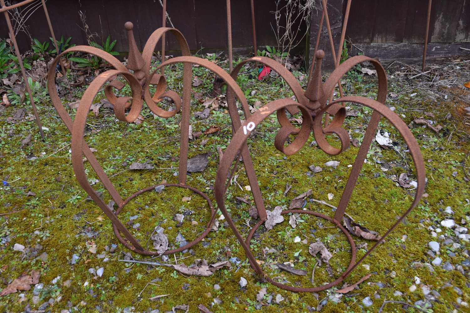 Lot 10 - Pair of metal crown plant supports, 45cm high