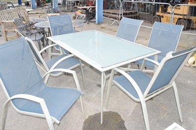 Lot 22 - Large metal and glass garden table with six...