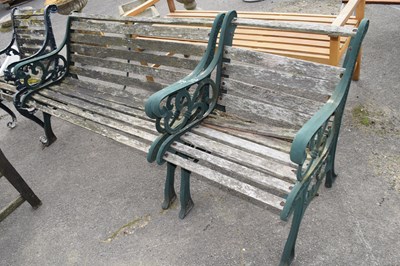 Lot 31 - Garden bench with cast iron ends, approx 126cm...