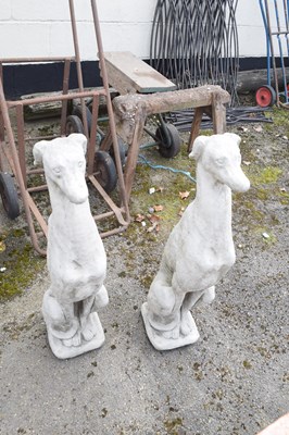 Lot 80 - Pair of composite seated whippets, height...