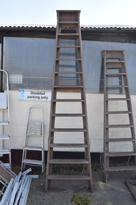 Lot 119 - Twelve rung wooden step ladder