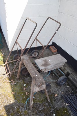 Lot 135 - Pair of gardeners potting trolleys with...