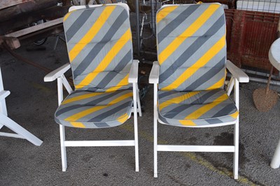 Lot 145 - Pair of white plastic sun loungers
