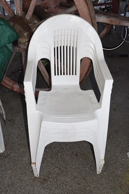 Lot 147 - Set of four plastic garden chairs