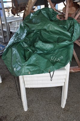 Lot 148 - Set of four plastic garden chairs with cover