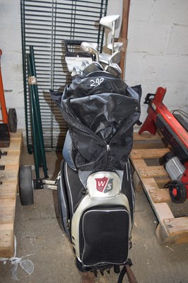 Lot 290 - Golf bag including Dunlop clubs and a trolley
