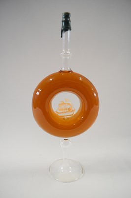 Lot 9 - Artisan brandy set in a circular bottle with...
