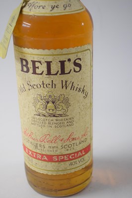 Lot 50 - Two various bottles of Bells Whisky comprising...