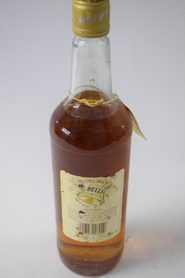 Lot 50 - Two various bottles of Bells Whisky comprising...