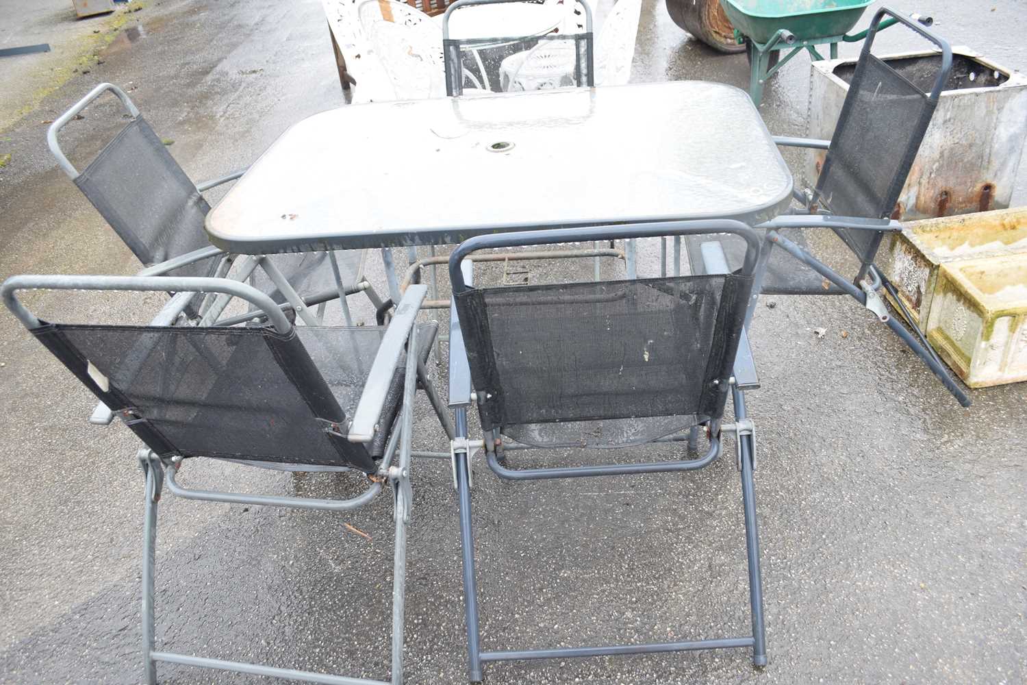 Lot 40 - Garden dining set with five chairs