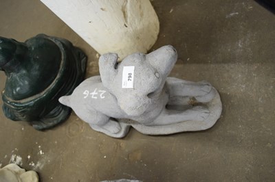 Lot 798 - Garden ornament formed as a dog, length 40cm