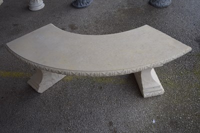 Lot 31 - Concrete garden bench, formed in a semi-circle,...