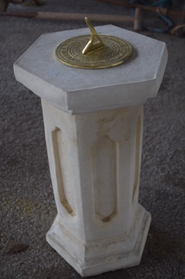 Lot 31d - Composite formed plinth with a brass sundial...