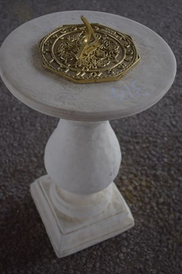 Lot 31 - Composite formed plinth with a brass sundial,...