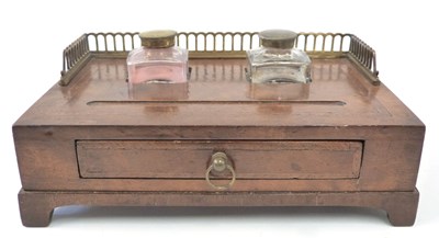 Lot 376 - A walnut desk set with two glass inkwells and...