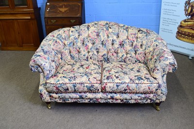 Lot 287 - Lincoln House floral upholstered two-seater...