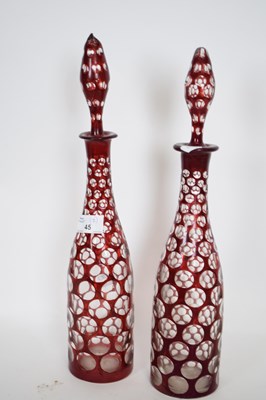 Lot 50 - Pair of decanters with tear drop stoppers in...